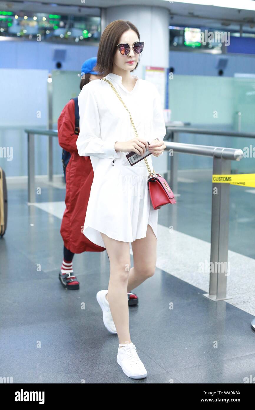 Chinese Uigur actress Gulnezer Bextiyar, also known as Gulnazar or Guli Nazha (Gulinazha), arrives at the Beijing Capital International Airport before Stock Photo