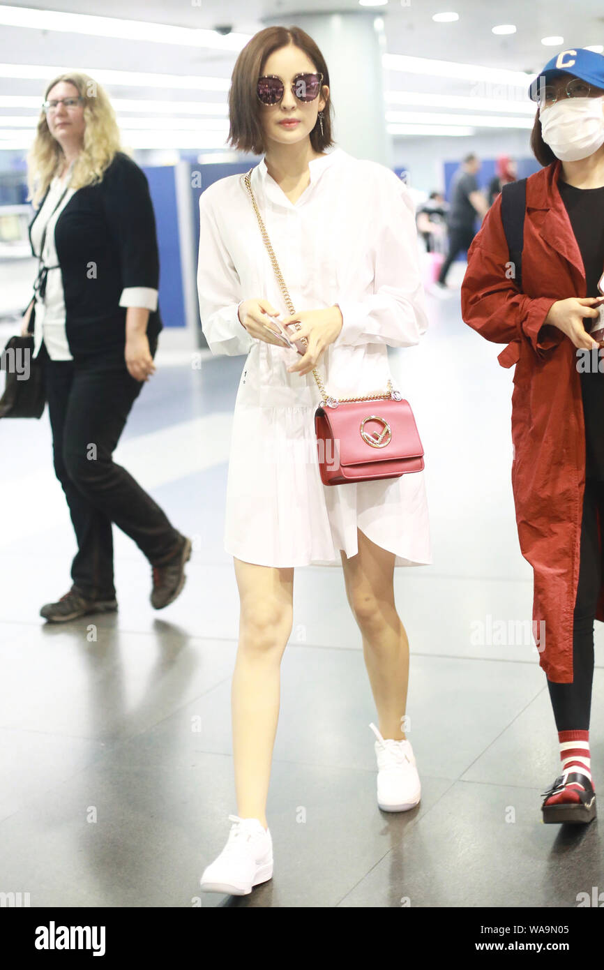 Chinese Uigur actress Gulnezer Bextiyar, also known as Gulnazar or Guli Nazha (Gulinazha), arrives at the Beijing Capital International Airport before Stock Photo
