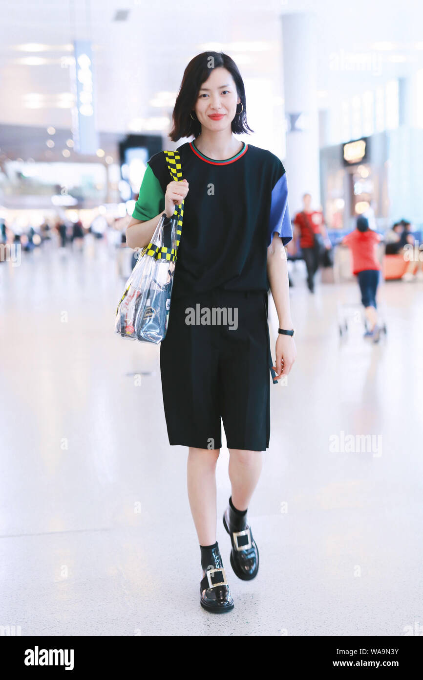 Chinese model Liu Wen arrives at the Shanghai Hongqiao International