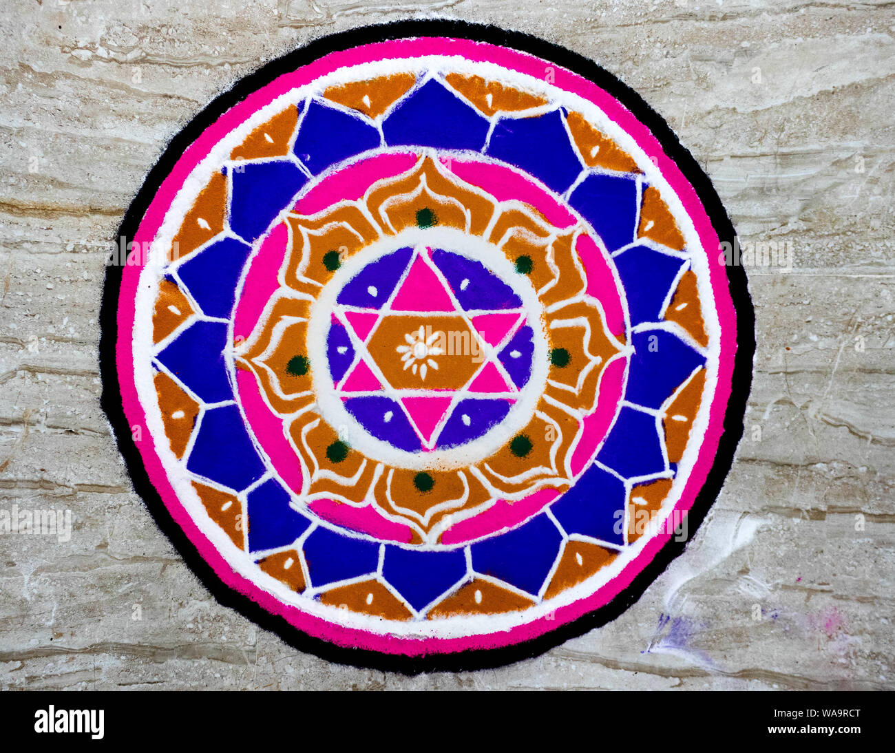 indian mandala art on floor Stock Photo - Alamy