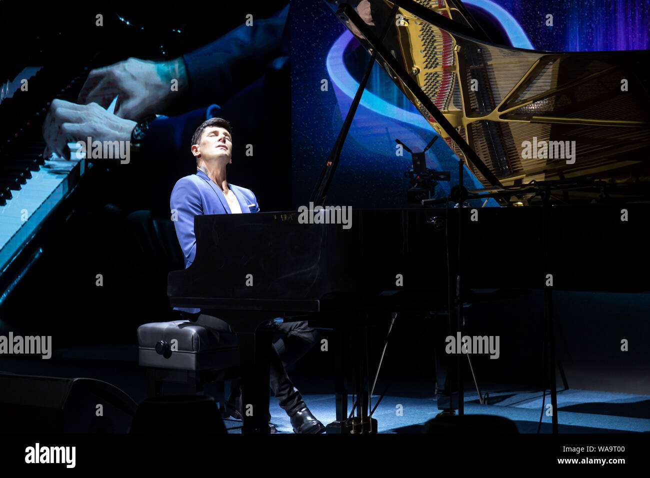 Croatian pianist Maksim Mrvica performs during the By-Health Nutrition Exploratorium Opening Ceremony in Zhuhai city, south China's Guangdong province Stock Photo