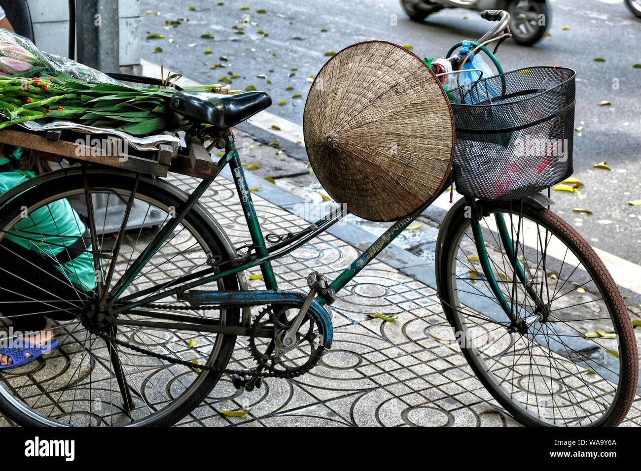 Retro bicycle parked at the road in Hanoi, Vietnam. Stock Photo