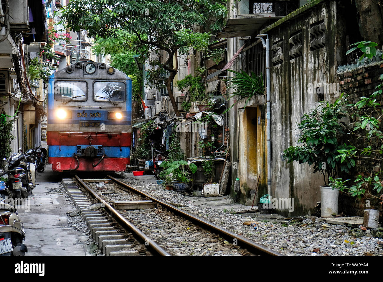 Crossing The Road In Vietnam Stock Photo - Download Image Now