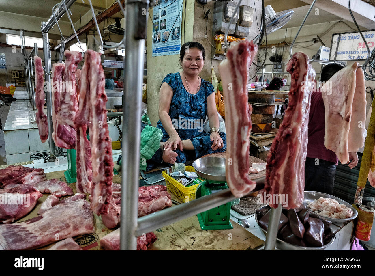 My Tho, Vietnam - August 9: A woman sell meat on market on August 9, 2018 in My Tho, Vietnam. Stock Photo
