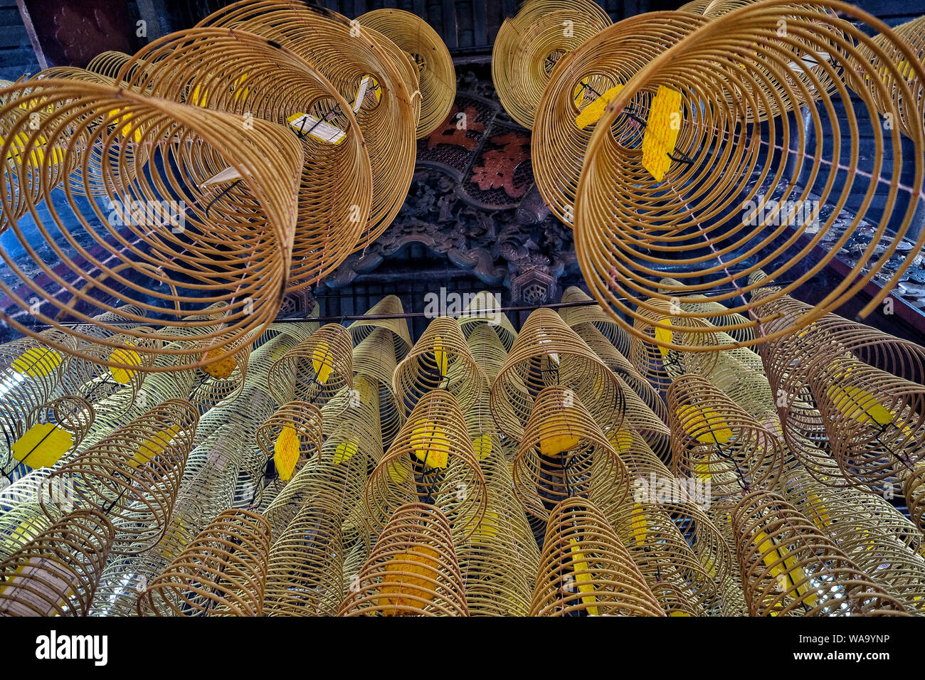 Incense spiral sticks for praying at Ong Temple in Can Tho, Vietnam. Stock Photo
