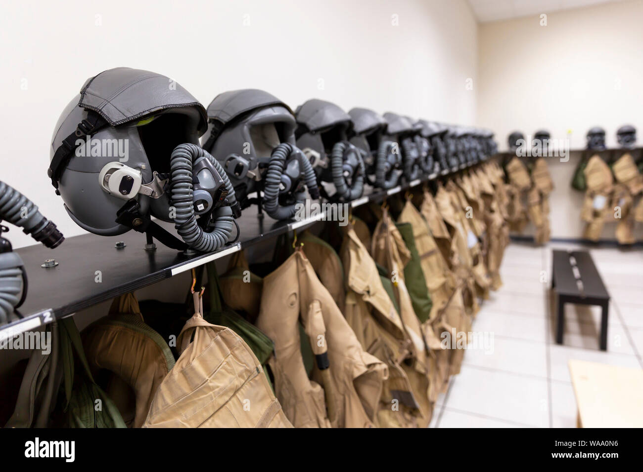 Dressing room of a fighter aircraft (jet fighter) pilot with uniforms