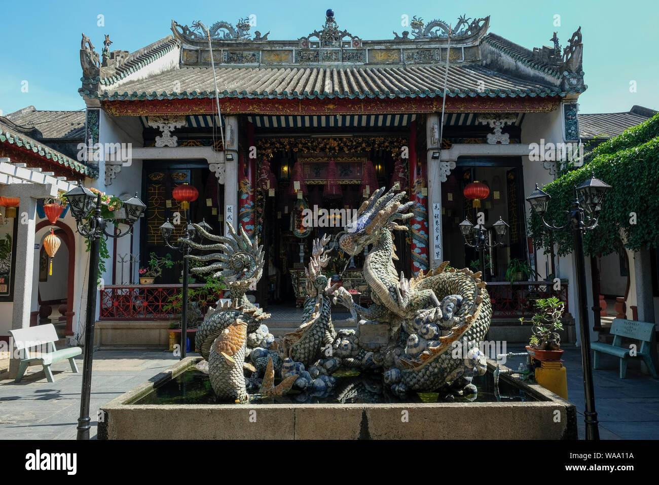 Hoi An, Vietnam - August 17: Dragon fountain at the Cantonese Assembly Hall (Quang Trieu) on August 17, 2018 in Hoi An, Vietnam. Stock Photo