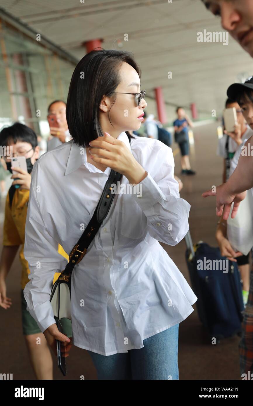 Chinese singer and actress Victoria Song or Song Qian arrives at the Beijing Capital International Airport before departure in Beijing, China, 16 July Stock Photo