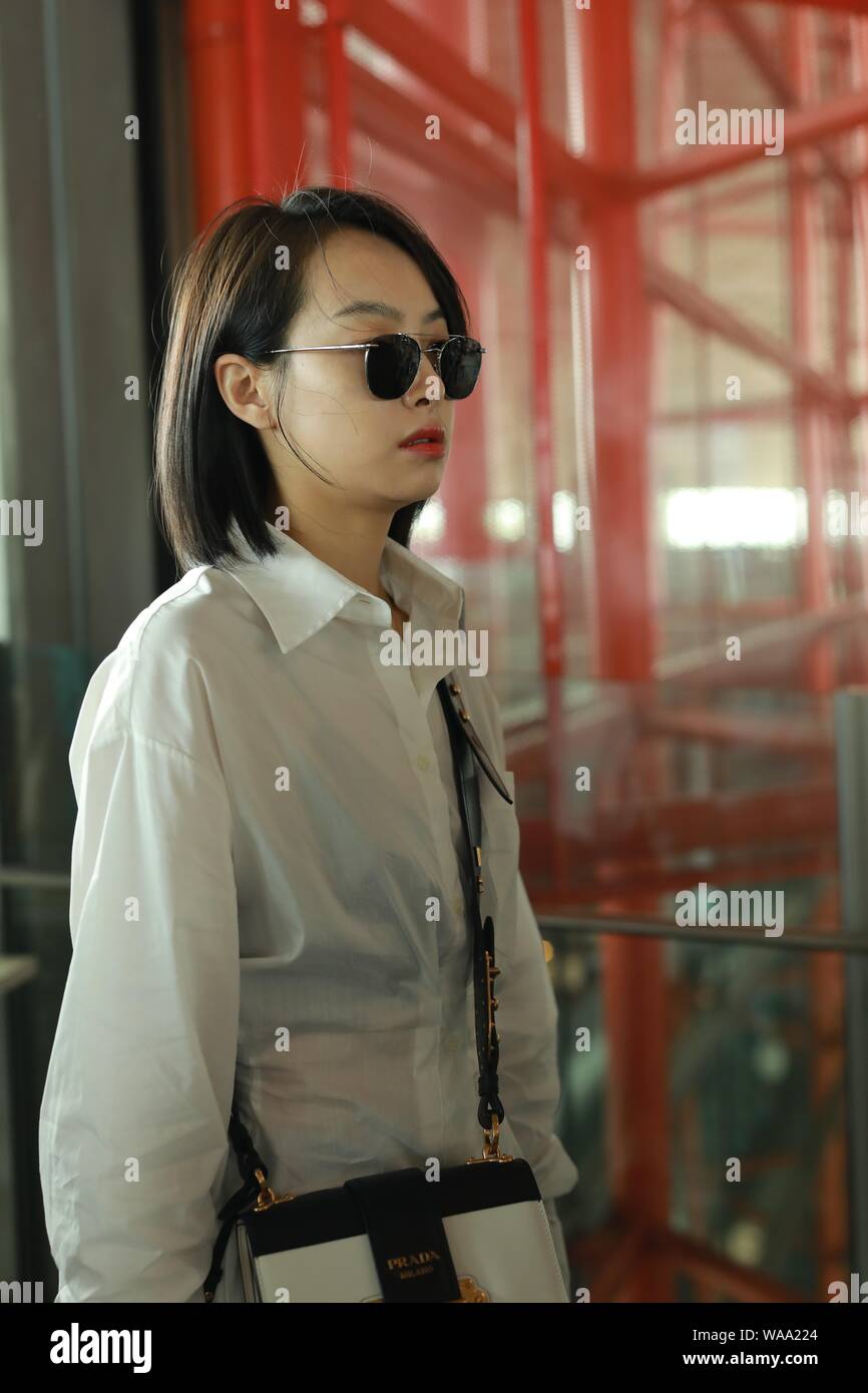 Chinese singer and actress Victoria Song or Song Qian arrives at the Beijing Capital International Airport before departure in Beijing, China, 16 July Stock Photo