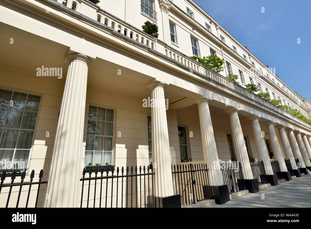 Terraced Luxury residences with stucco facade, Eaton Square, garden square, Belgravia, West London, United Kingdom Stock Photo