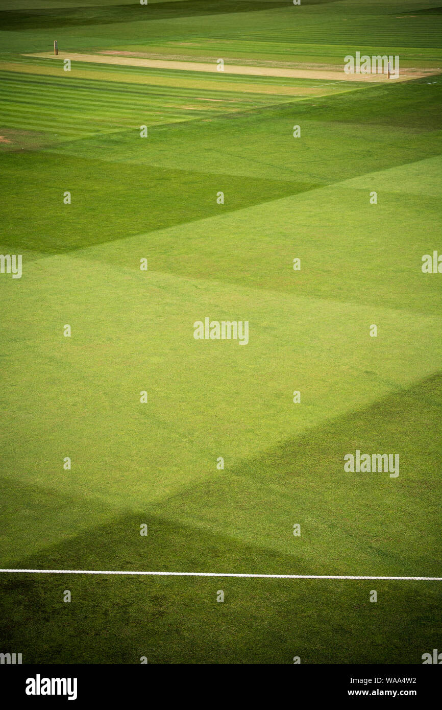 Cricket pitch with stumps and boundary rope Stock Photo