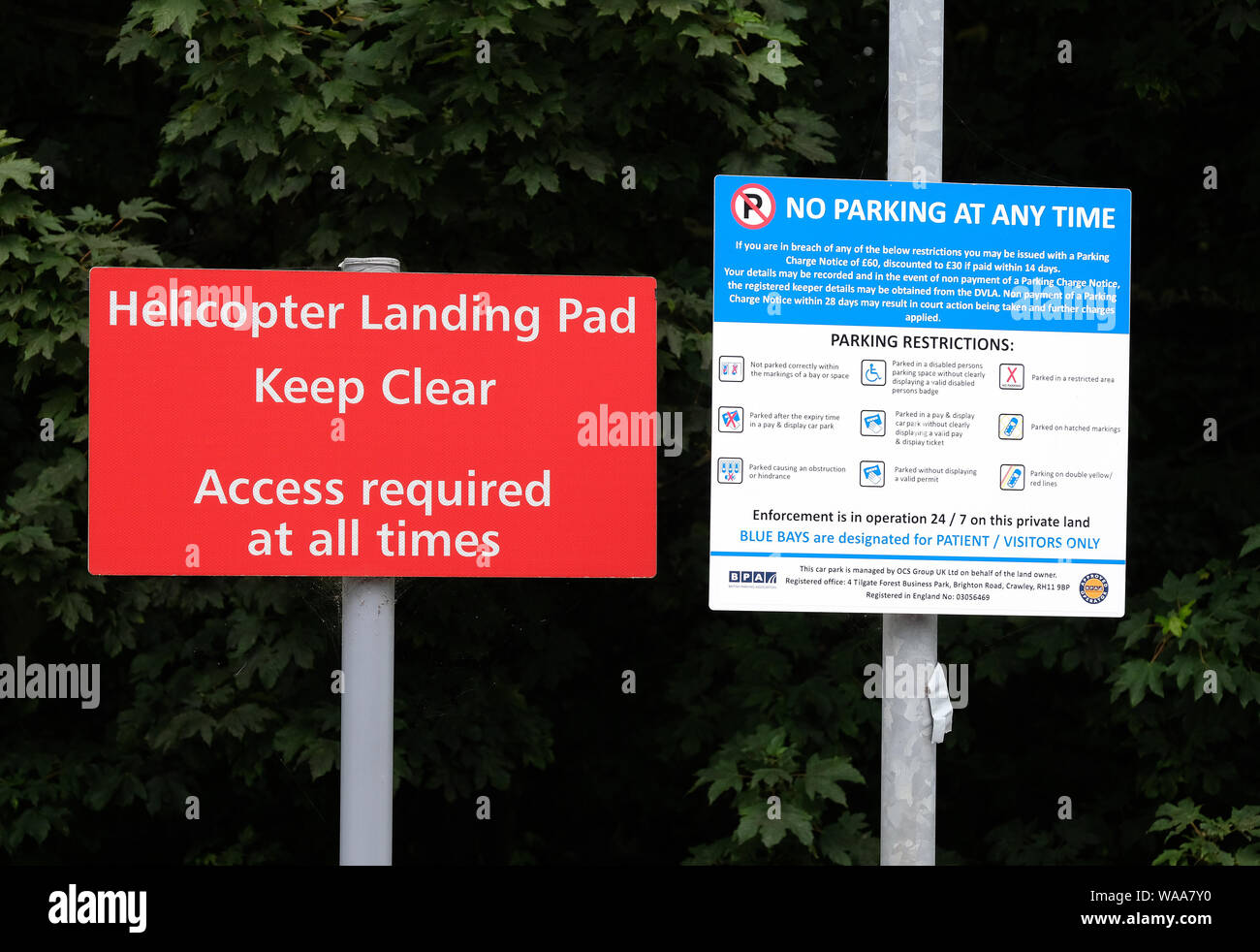 Signs for helicopter landing pad at hospital in UK. Stock Photo
