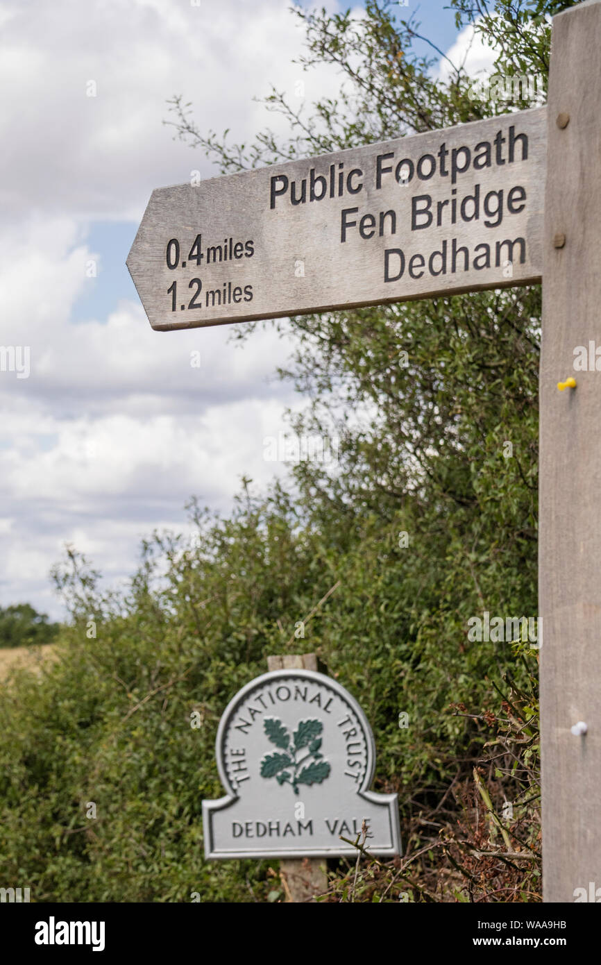 Footpath sign in Dedham Vale area of outstanding natural beauty made famous by painter John Constable on the Essex Suffolk border. Stock Photo