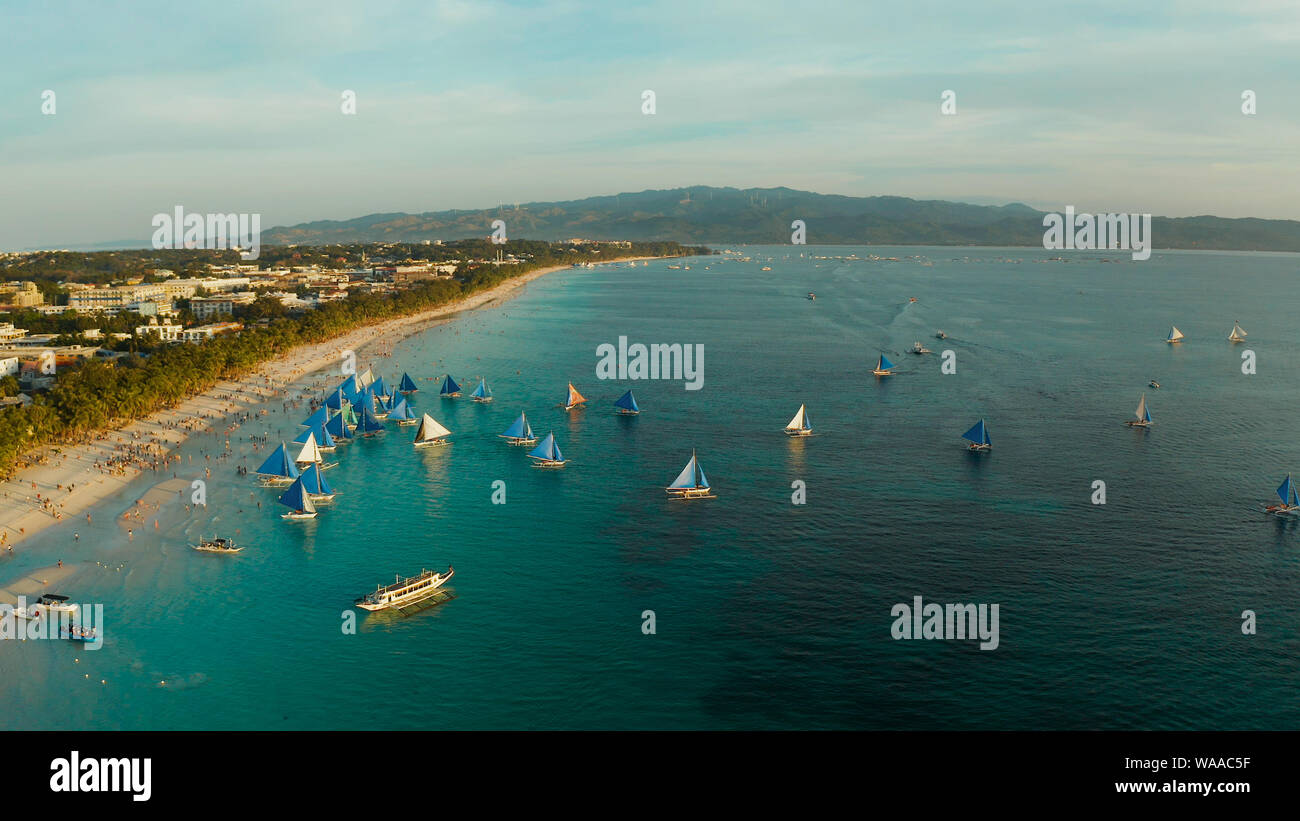Beautiful sunset on beach boats hi-res stock photography and images - Alamy