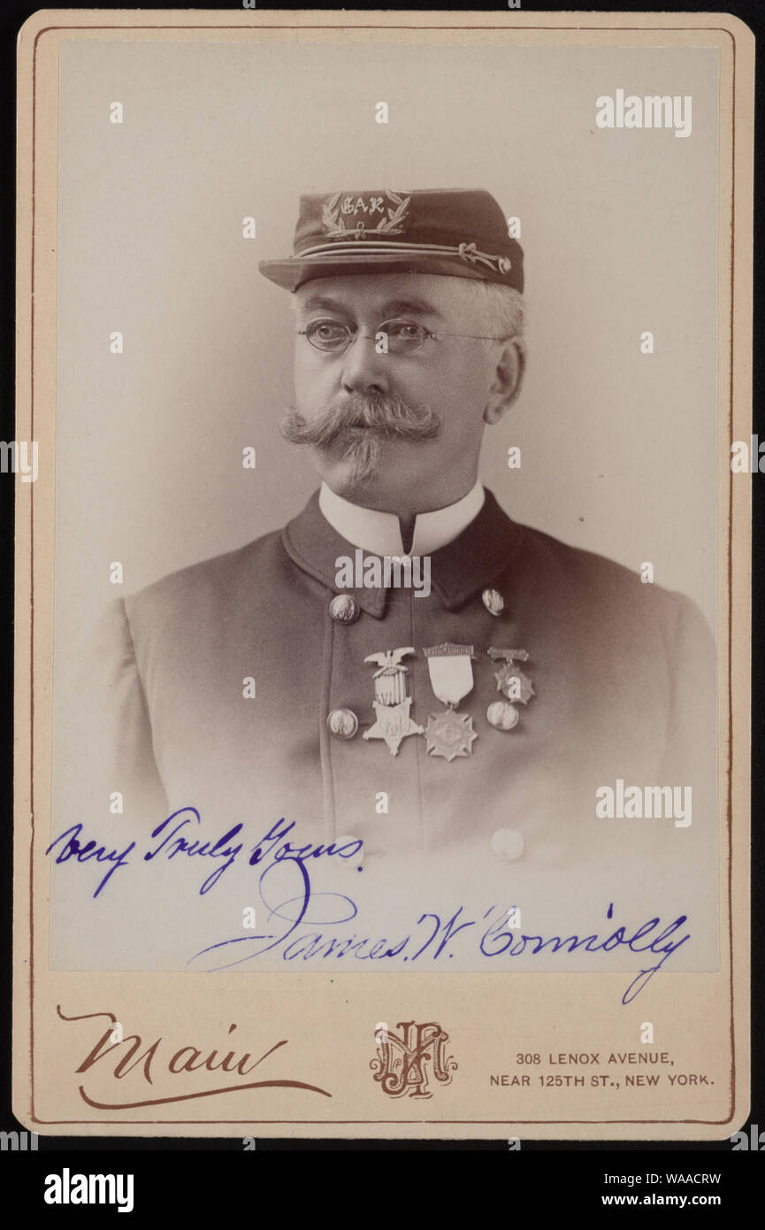 Civil War veteran James W. Connelly in G.A.R. uniform with medals] / Main, 308 Lenox Avenue, near 125th St., New York Stock Photo