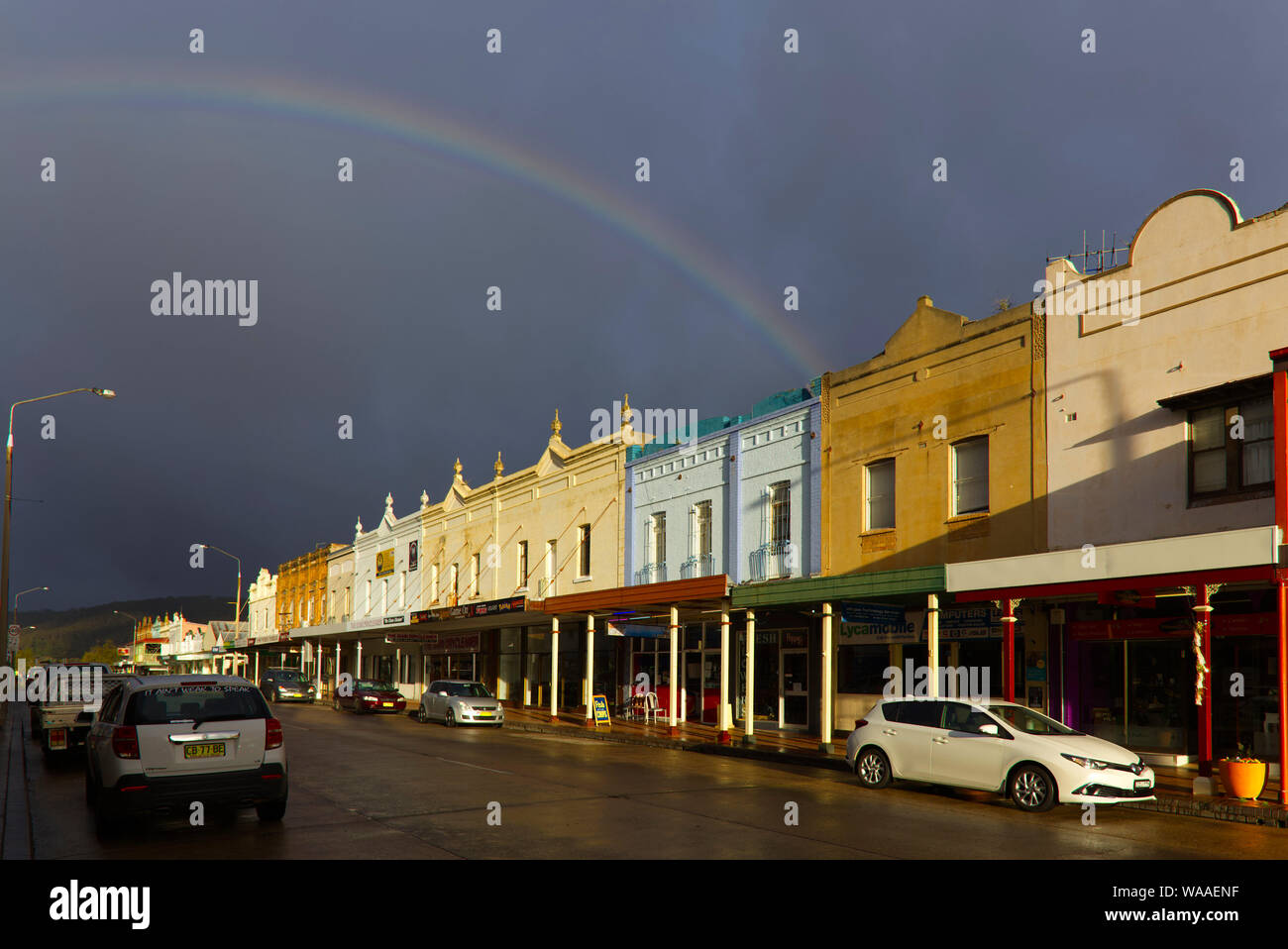 Rainbow over shops  Lithgow New South Wales Australia Stock Photo