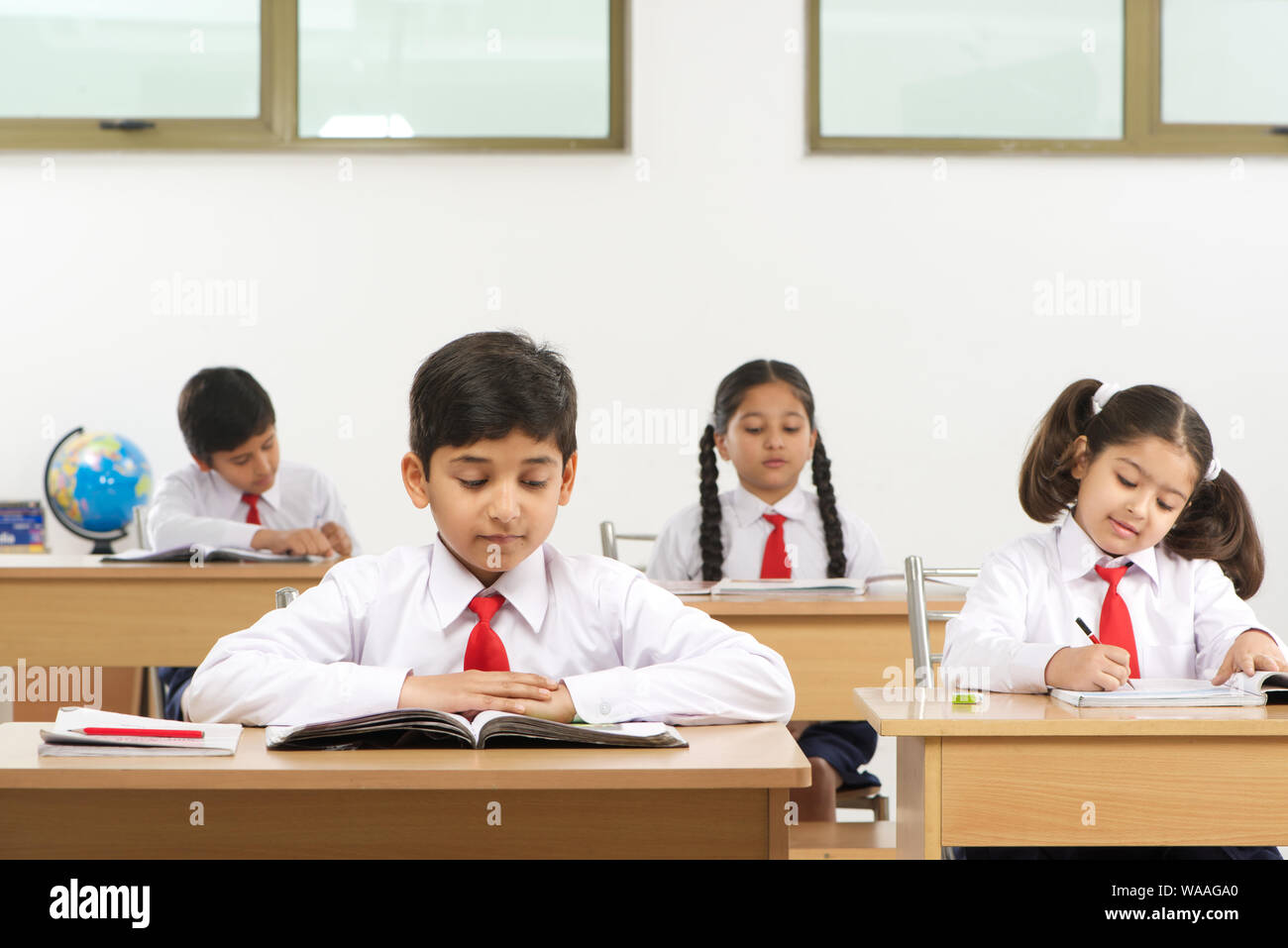Children Studying In Class