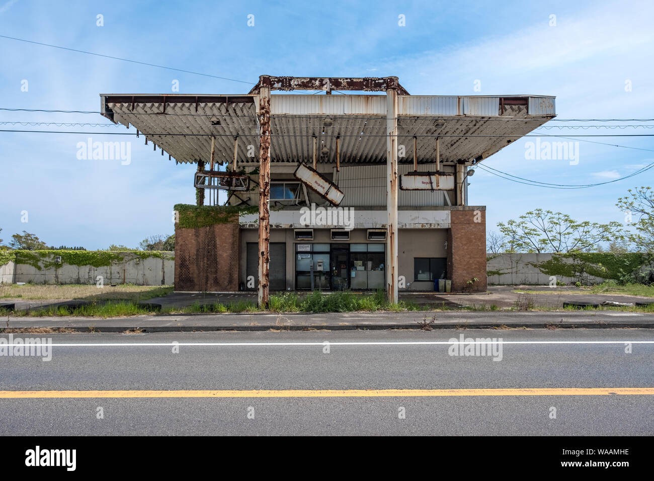 An abandoned petrol station on a highway in Miyazaki, Japan Stock Photo