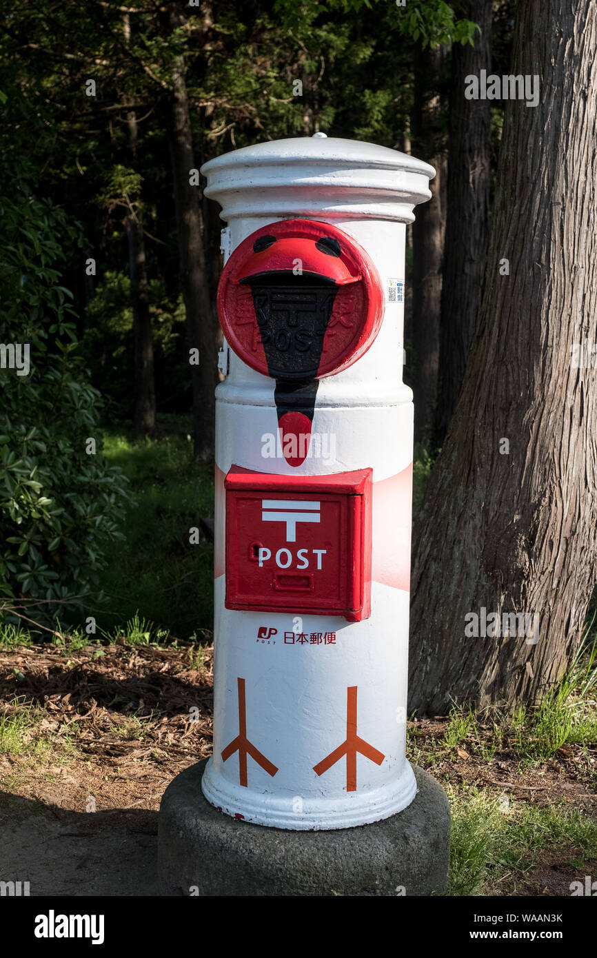A post box with a bird design on Sado Island, Japan Stock Photo