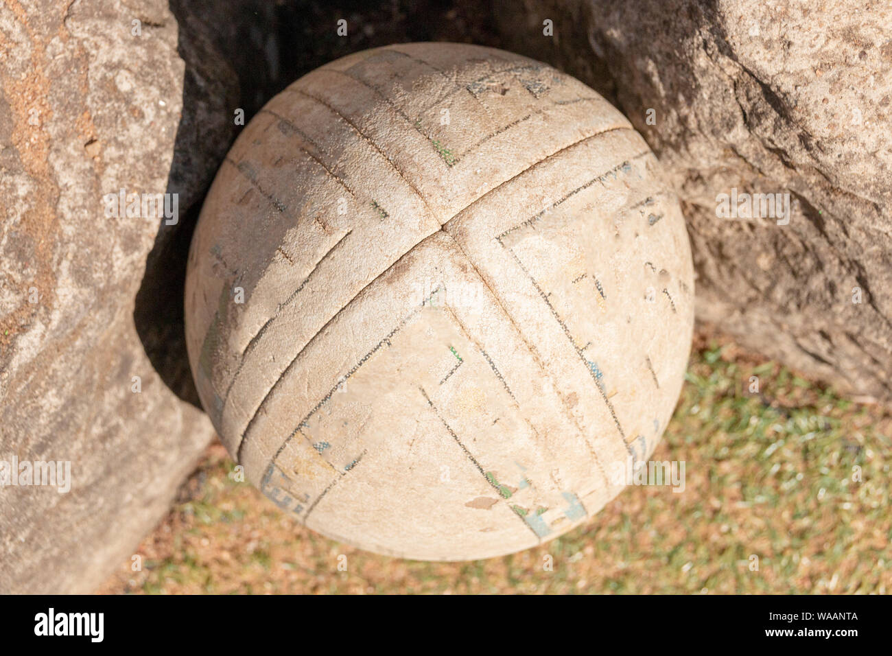 A close up top view of rugby ball on a green grass background Stock Photo