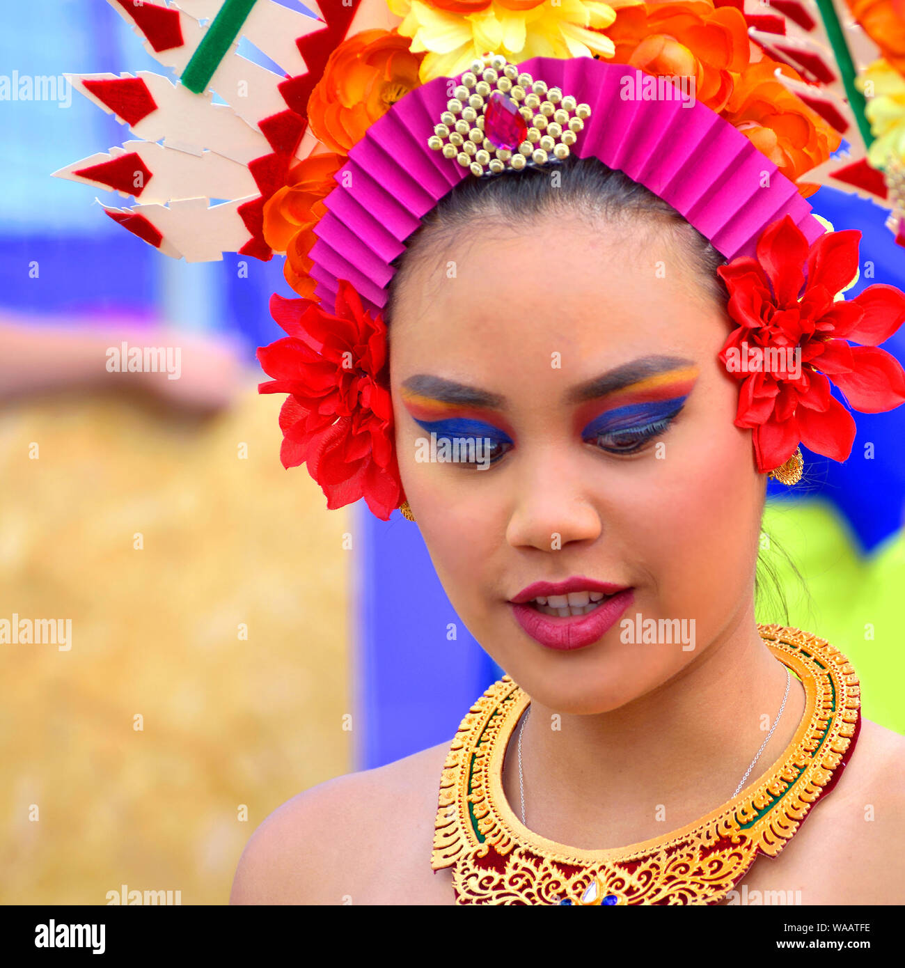 London, UK. Supporter in traditional costume of the Indonesian Cricket