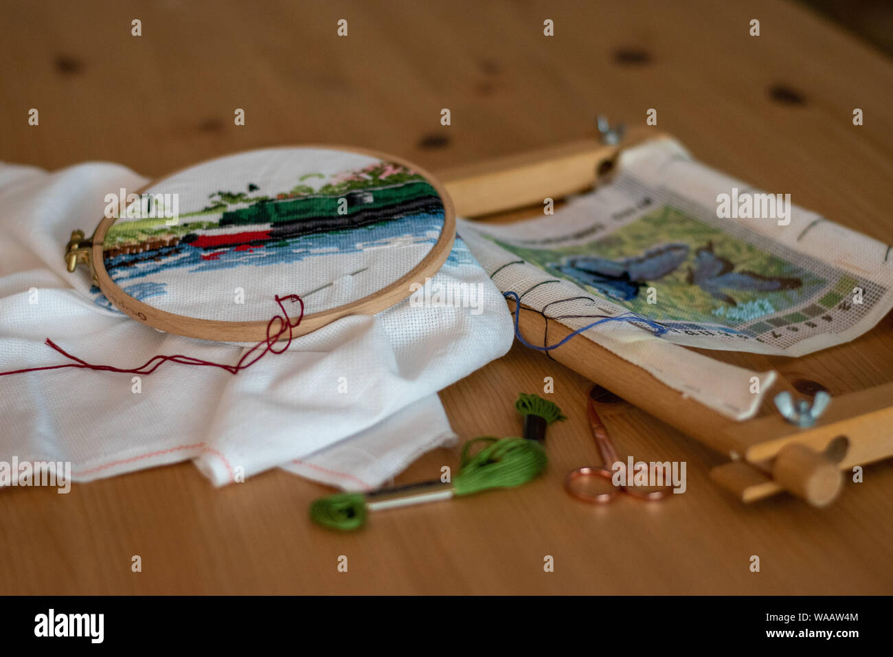 Crossstitch embroidery materials, including threads, needles, scissors