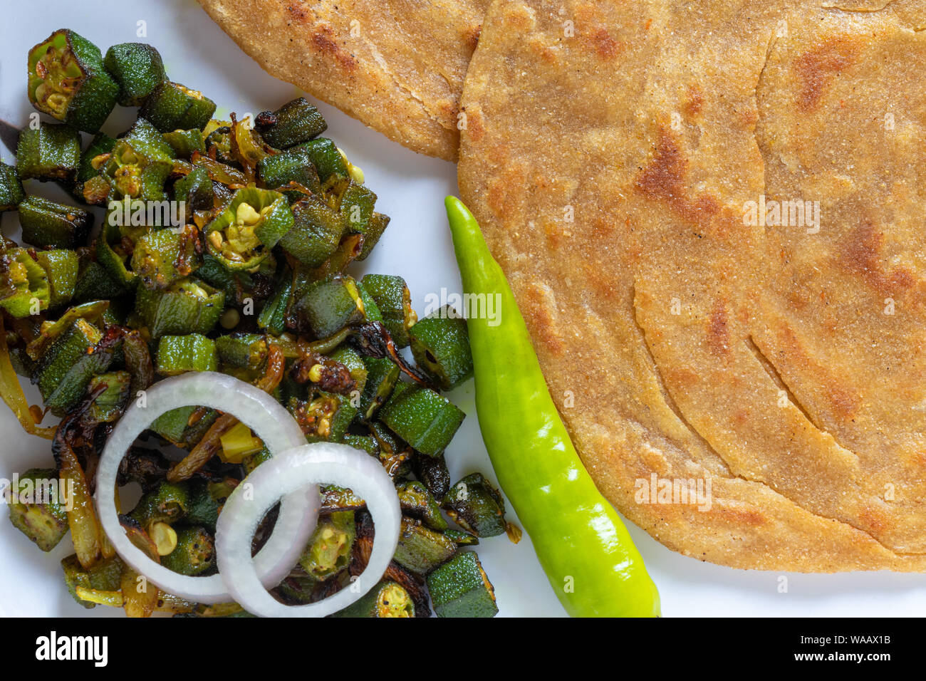 Lachha Paratha, whole wheat layered flat bread with Masala Bhindi (Lady