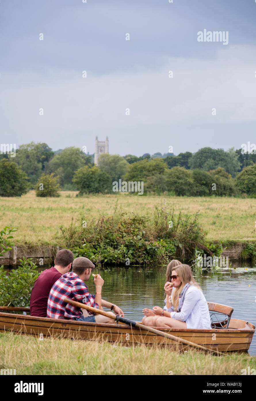 Visitors to Flatford Mill hire rowing boats to explore the River Stour