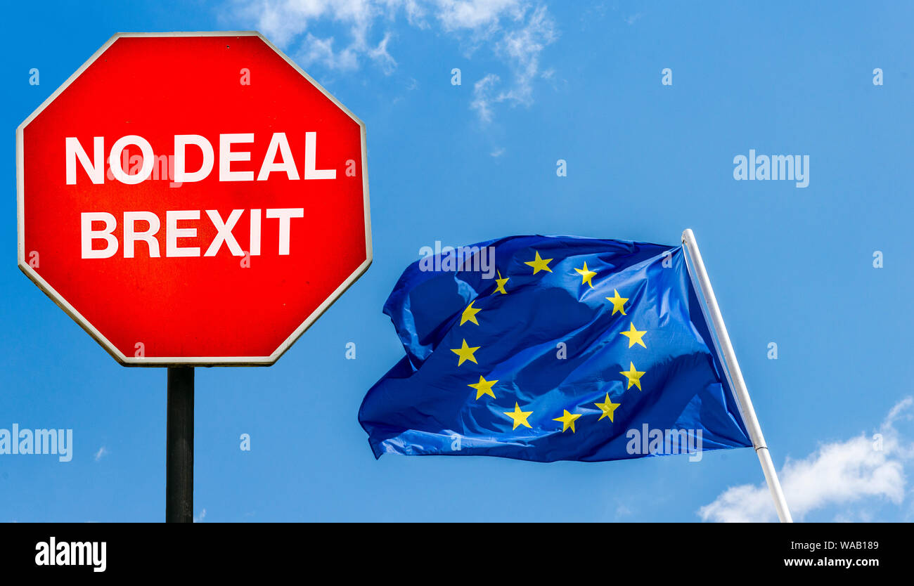 No Deal Brexit written on octagon stop sign with EU flag on background. UK is set to leave the EU on October 31st, 2019 Stock Photo