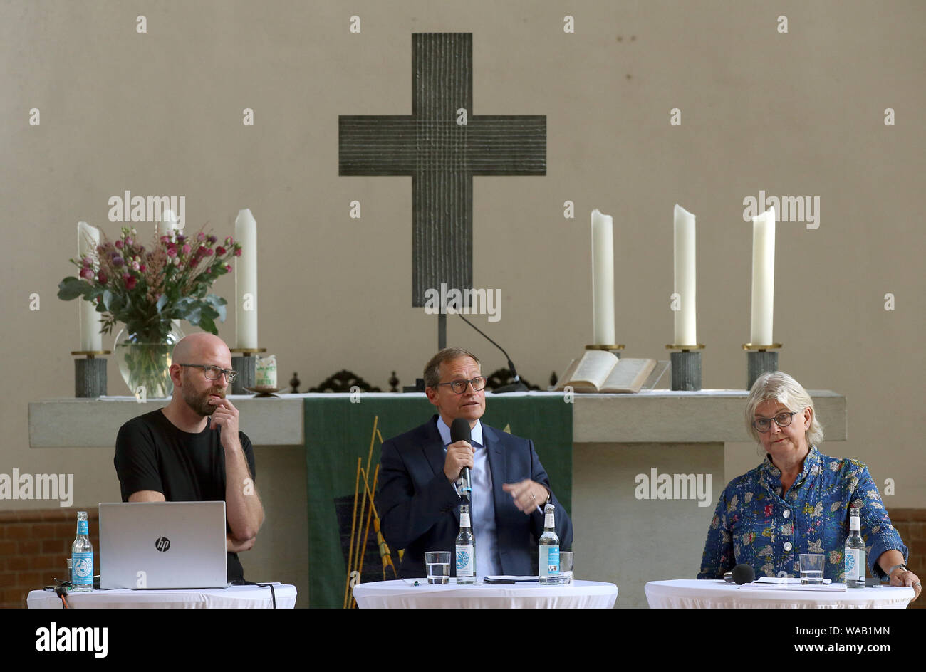 Berlin, Germany. 19th Aug, 2019. Moritz van Dülmen (l-r), Managing Director of Kulturprojekte Berlin GmbH, Michael Müller (SPD), Berlin's Governing Mayor, and Marianne Birthler, former Director of the Stasi Documentation Authority, present the programme for the 30th anniversary of the fall of the Berlin Wall in the Gethsemanekirche. Credit: Wolfgang Kumm/dpa/Alamy Live News Stock Photo