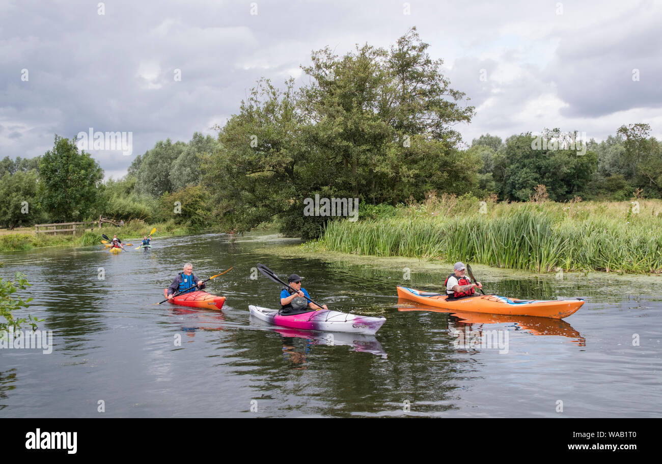 Visitors to Flatford Mill hire rowing boats to explore the River Stour