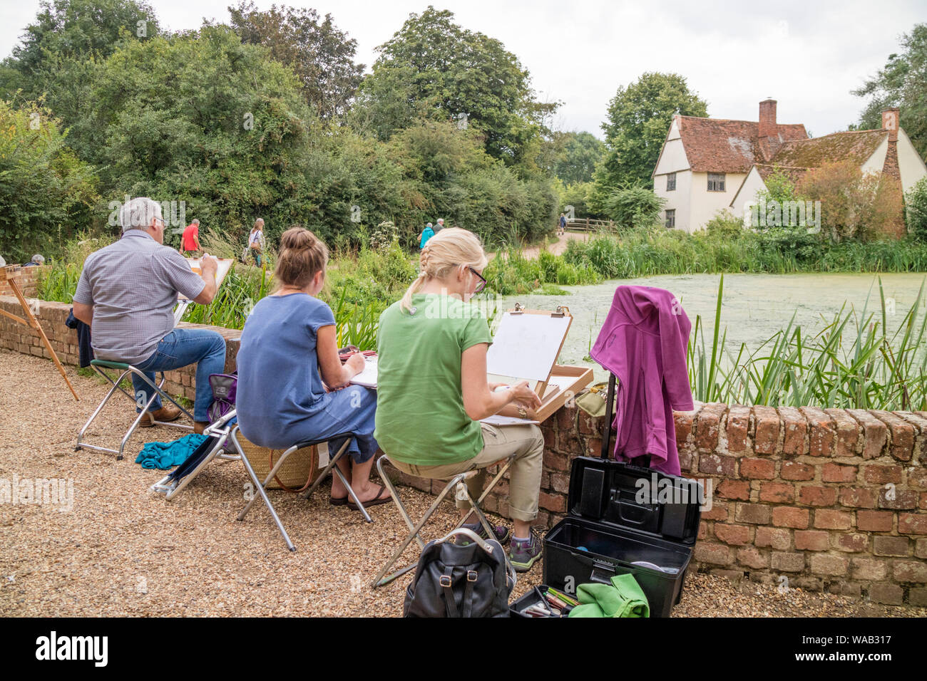 Artists painting Willy Lott's house at the National Trust's Flatford