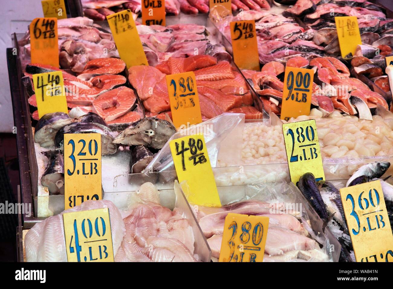 Salmon and other fish at fish store in Chinatown, Lower Manhattan, New