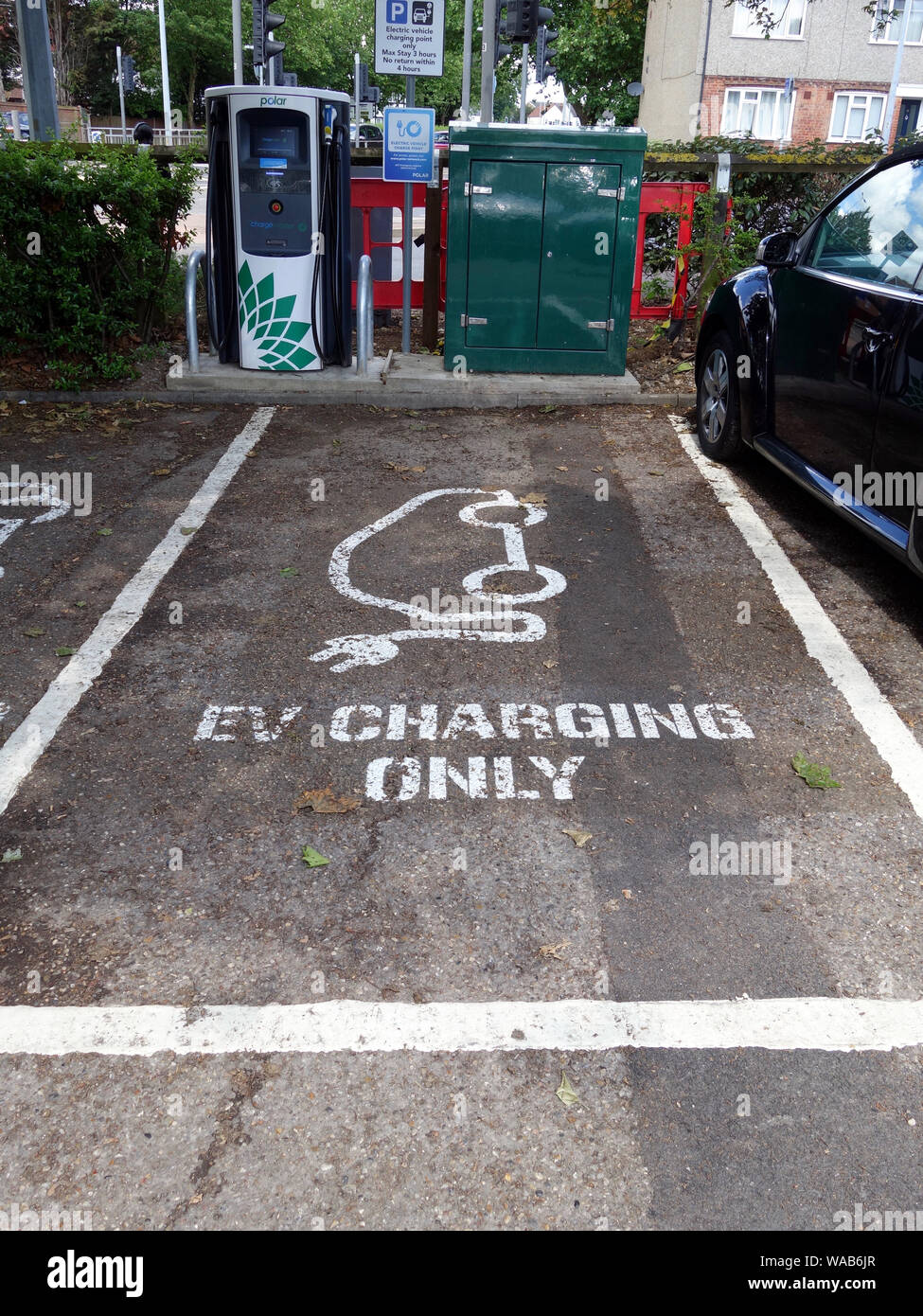 A dual parking zone for charging electric vehicle cars Stock Photo