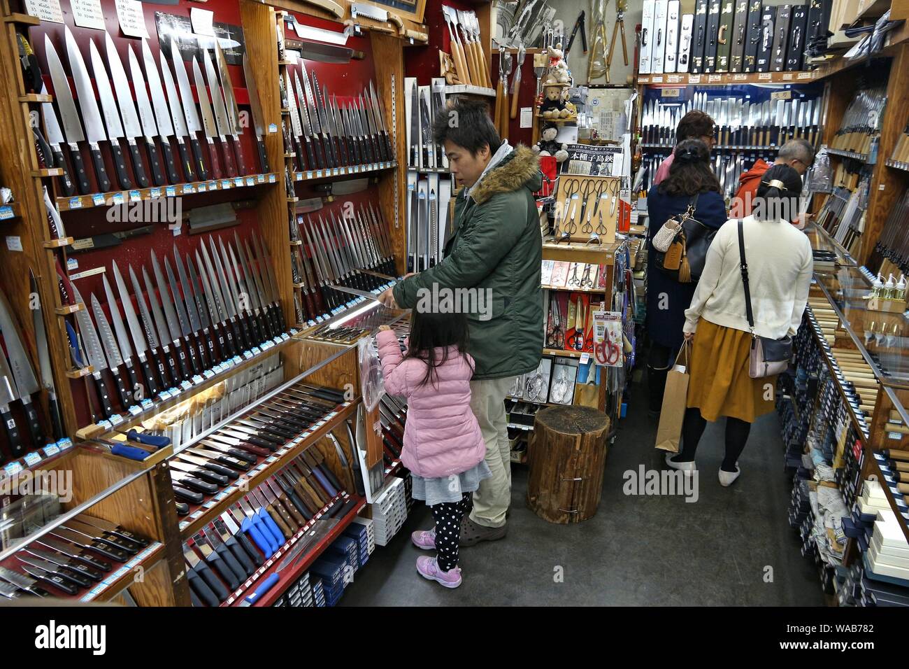 TOKYO, JAPAN DECEMBER 4, 2016 Shoppers visit specialist knife store
