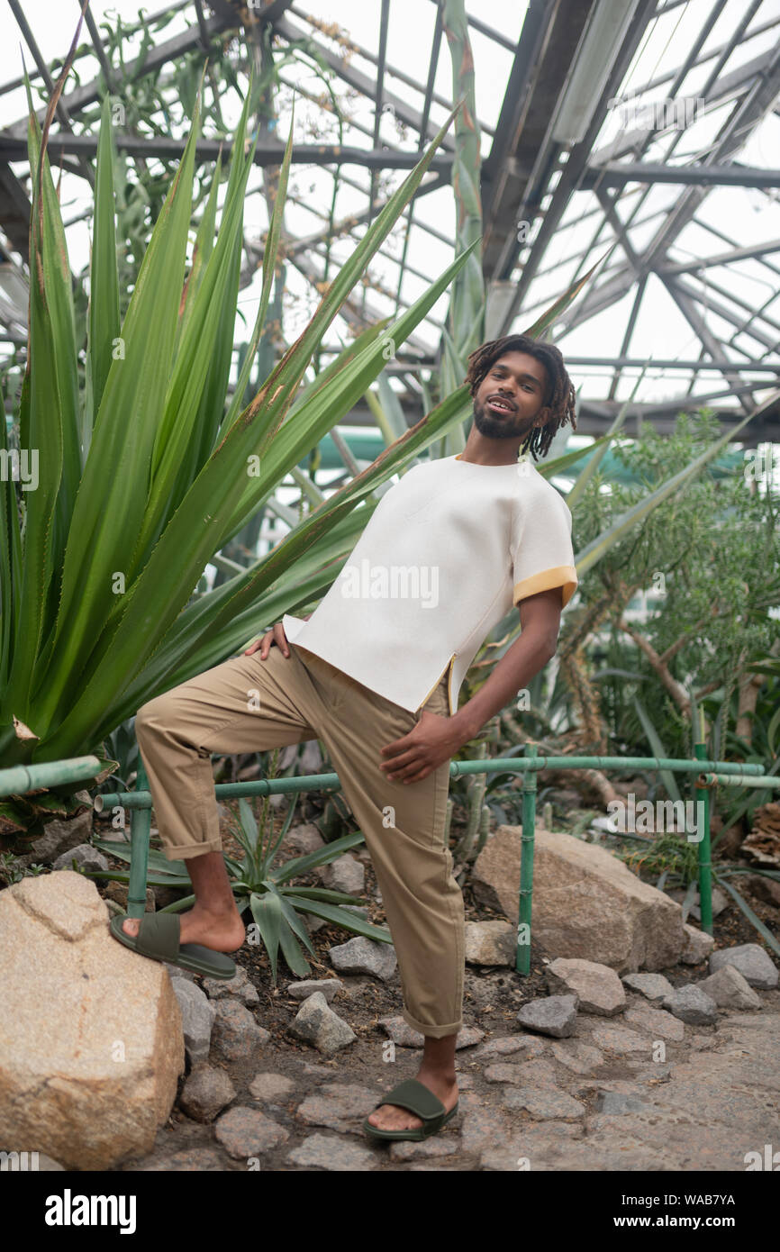 Bearded man posing while promoting summer collection Stock Photo