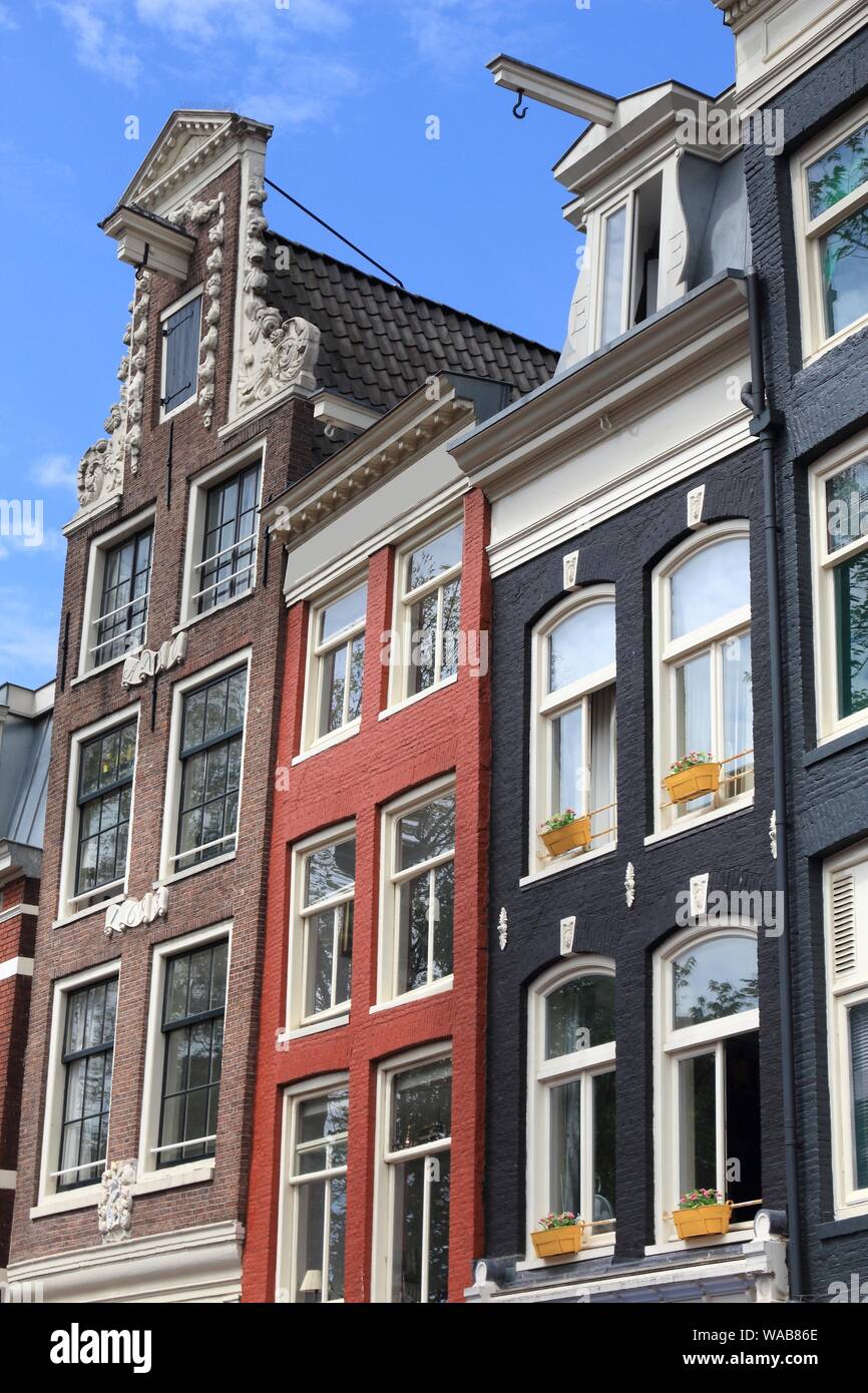 Amsterdam city architecture - Oudezijs Voorburgwal residential buildings. Netherlands rowhouse. Stock Photo
