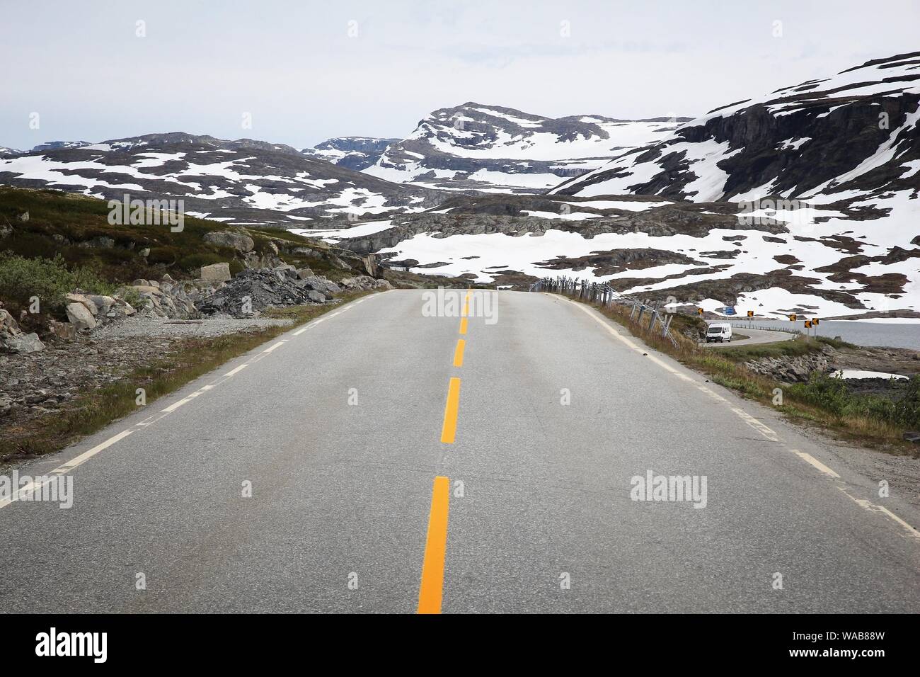 Norway landscape - Hallingskarvet mountain road with snow in summer. July view. Stock Photo