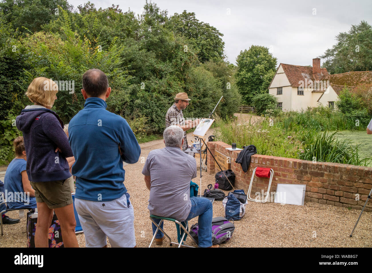Artists painting Willy Lott's house at the National Trust's Flatford