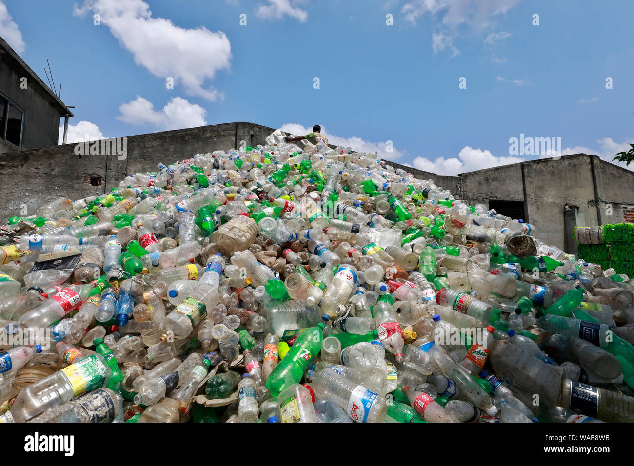 Dhaka, Bangladesh August 19, 2019 A Bangladeshi worker collects
