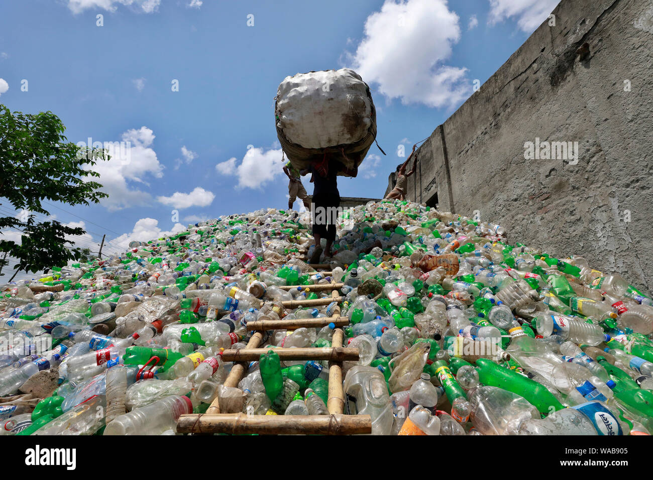 Dhaka, Bangladesh August 19, 2019 A Bangladeshi worker collects