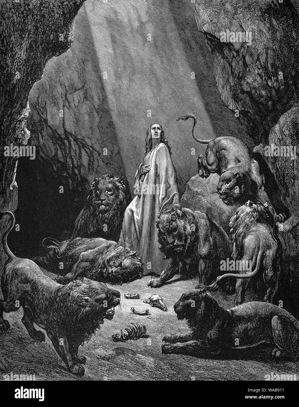 Gustave Doré, Daniel in the Lions' Den, engraving, 1866 Stock Photo