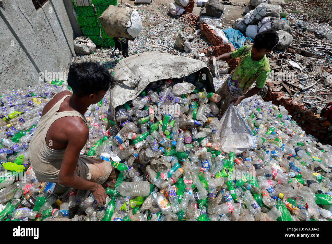Dhaka, Bangladesh August 19, 2019 A Bangladeshi worker collects