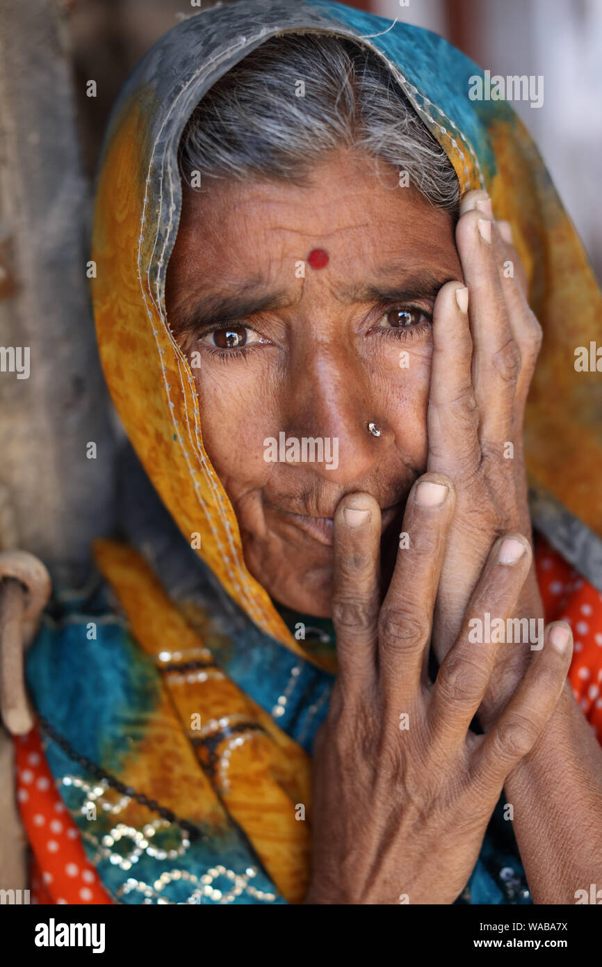 Old Rajasthani woman with traditional sari in Jaisalmer, India Stock Photo