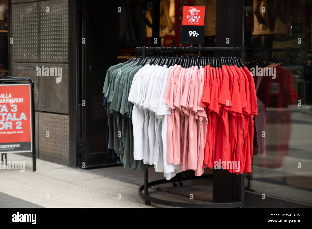 Stockholm, Sweden June 7 2019: Summer sale at the store. Big red day sale  poster and buyers Stock Photo - Alamy