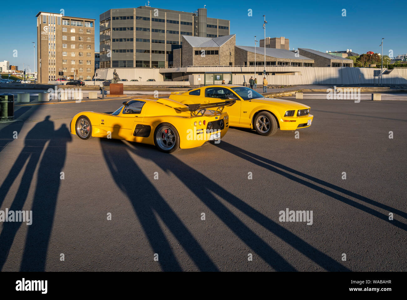 Yellow Ultima and Mustang on display, Independence Day, Reykjavik, Iceland Stock Photo