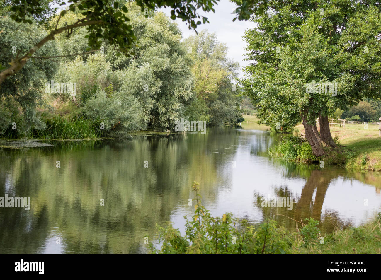The River Stour near the National Trust's Flatford Mill made famous by the artist John Constable 1776 -1837, Suffolk, England, UK Stock Photo