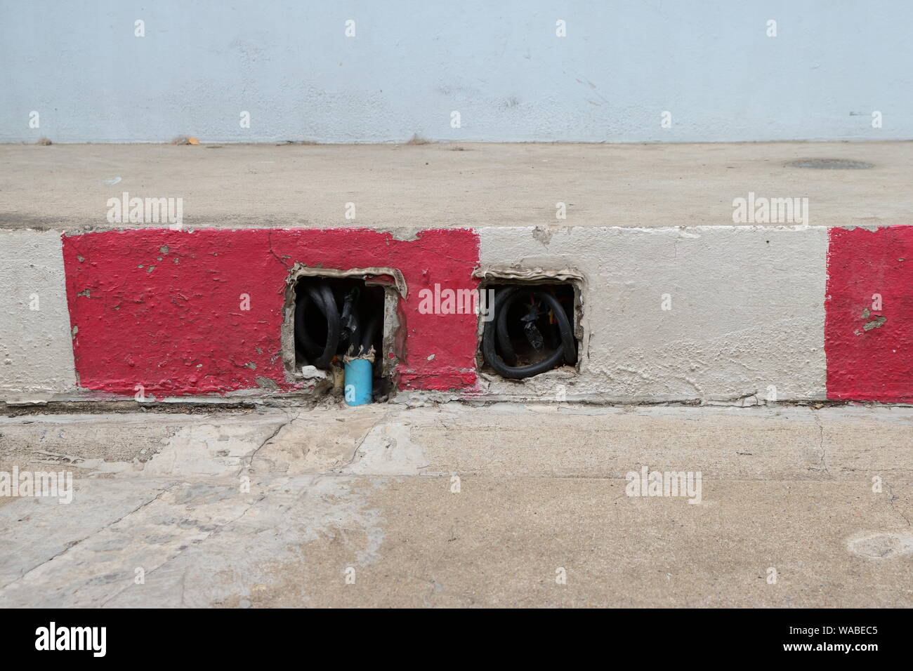 Closeup electrical cables installed underground in the pits inside