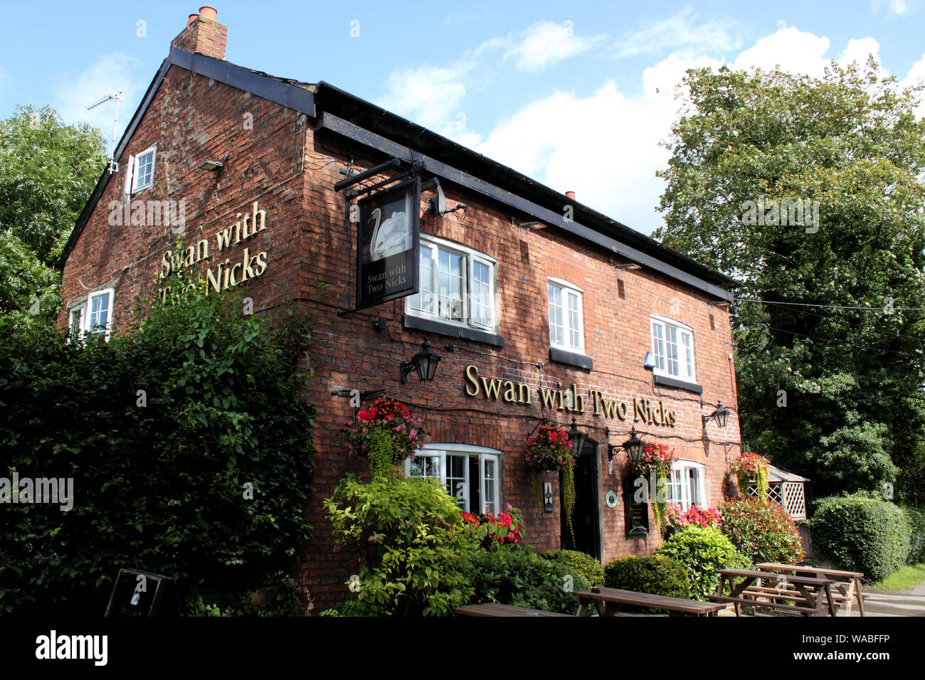 View of English country pub, the Swan with Two Nicks Stock Photo Alamy