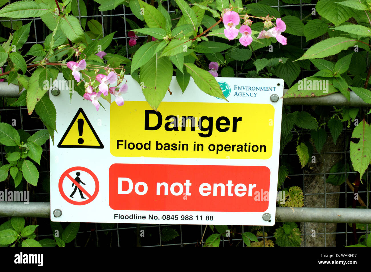 Sign warning of flood risk Stock Photo